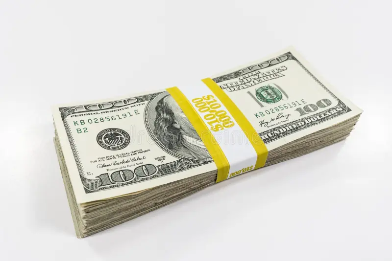 A stack of one hundred dollar bills secured with a yellow currency strap labeled ten thousand dollars.