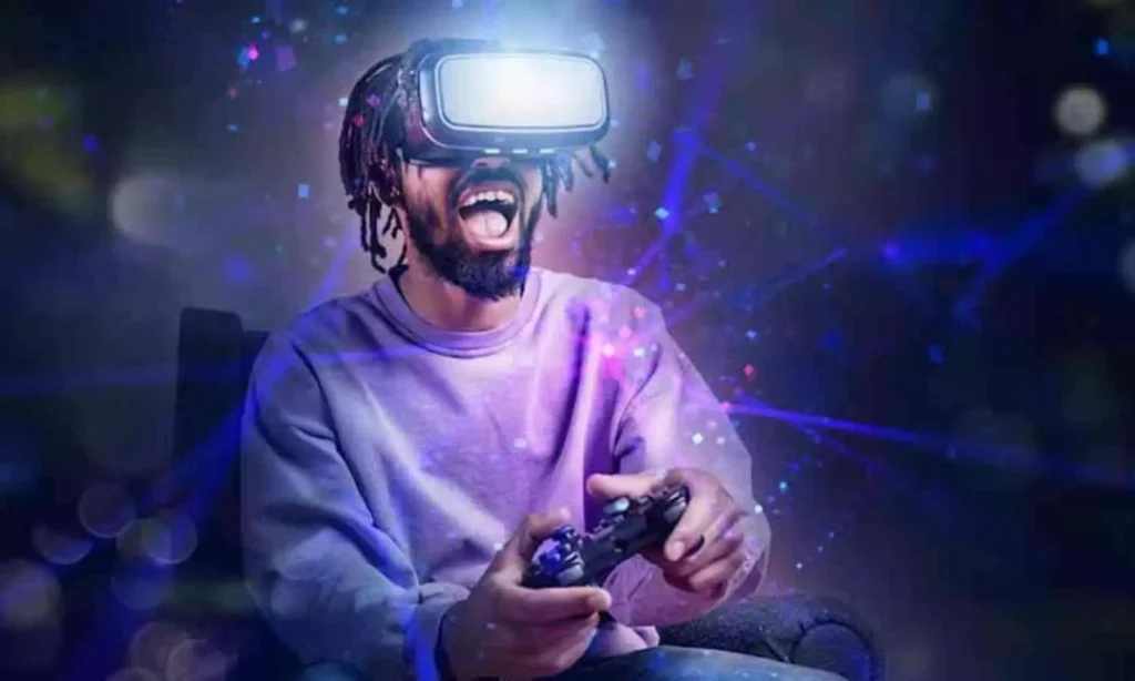 Individual wearing a virtual reality headset and holding a gaming controller, expressing excitement.