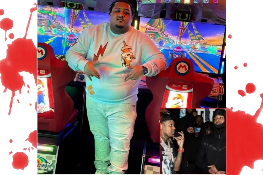 Individual posing in front of Mario Kart arcade machines in an entertainment venue.