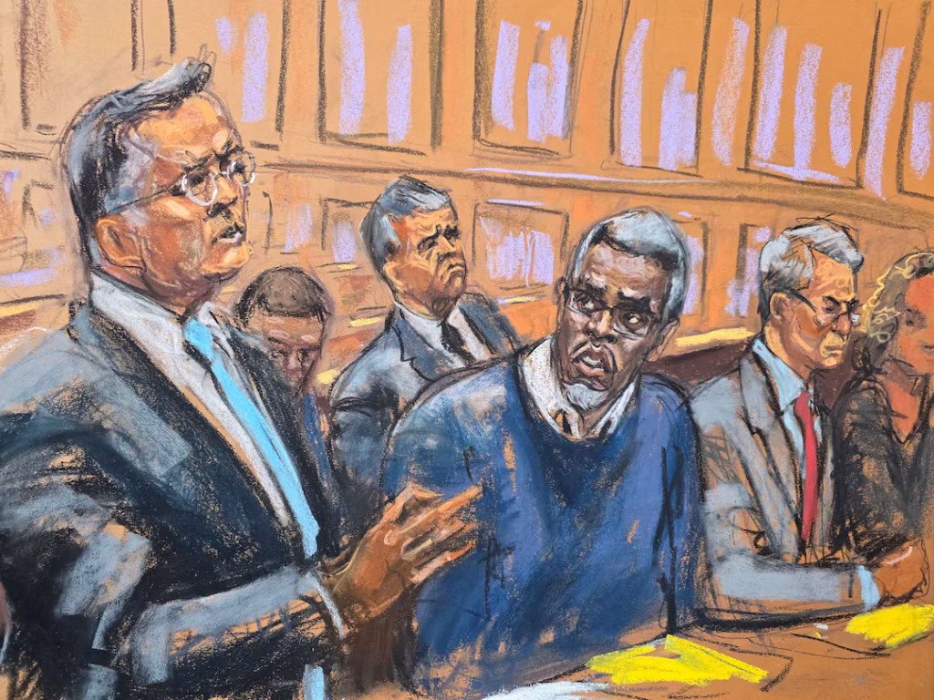 Courtroom sketch depicting a lawyer speaking while seated defendants listen attentively.