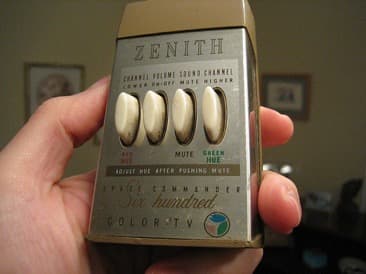Zenith remote control with four buttons for channel and sound adjustments.
